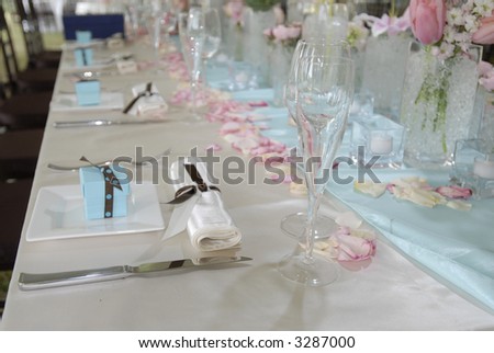 stock photo Wedding banquet table with baby blue gifts