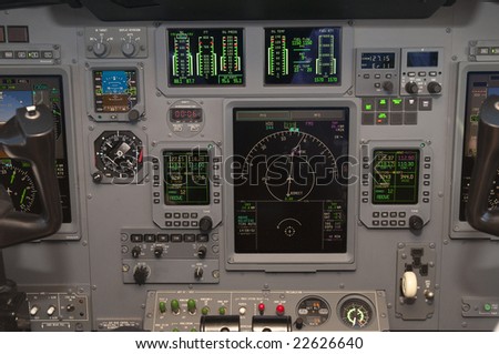 Corporate jet cockpit view with digital instruments