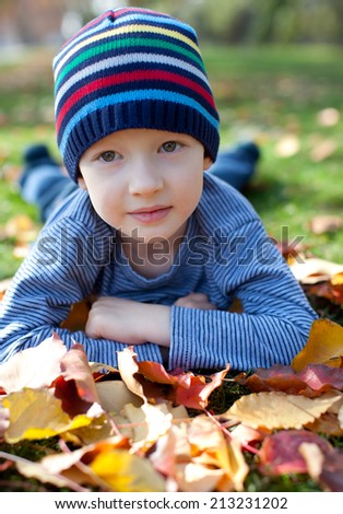 cute kid at fall time