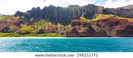 panorama of dramatic cliffs at na pali coast at kauai, hawaii, view from water