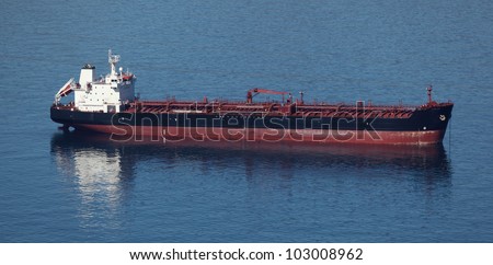 Tanker ship anchoring at the coast