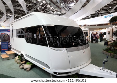 DUSSELDORF - AUGUST 27: Futuristic Hobby mobile home at the Caravan Salon Exhibition 2012 on August 27, 2012 in Dusseldorf, Germany.