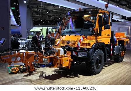 HANNOVER - SEP 20: New Mercedes Benz Unimog Road Cleaning Truck at the International Motor Show for Commercial Vehicles on September 20, 2012 in Hannover Germany