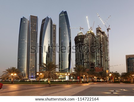 Skyscrapers in Abu Dhabi at dusk, United Arab Emirates