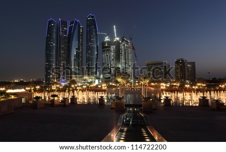 Skyscrapers in Abu Dhabi at dusk United Arab Emirates Skyscrapers in Abu Dhabi at dusk United Arab Emirates