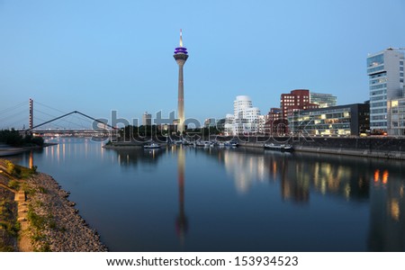 DUSSELDORF, GERMANY -  SEPT 4: Night view of the Media Harbor (Medienhafen) on September 04, 2013 in Dusseldorf, Germany. The Media Harbor is the most popular destination for tourism in the city.