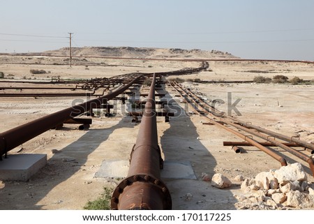 Oil and gas pipeline in the desert of Bahrain, Middle East