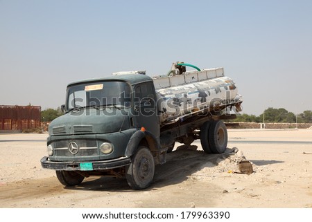 DOHA, QATAR - DEC 17: Old Mercedes Benz water truck in Qatar, Middle East. December 17th 2013 in Doha, Qatar, Middle East