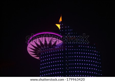 DOHA, QATAR - DEC 16: Doha World Trade Centre at night. Qatar, Middle East. December 16th 2013 in Doha, Qatar, Middle East