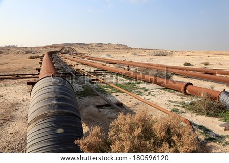Oil and gas pipeline in the desert of Bahrain, Middle East