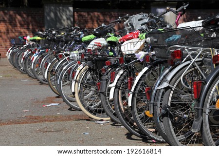 MUNSTER, GERMANY - MAY 3: Bicycles in a parking lot in the city of Munster. May 3, 2014 in Munster, North Rhine-Westphalia, Germany