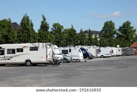 MUNSTER, GERMANY - MAY 3: Mobile homes parked in the outlying area of Munster. May 3, 2014 in Munster, North Rhine-Westphalia, Germany