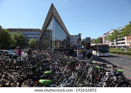 MUNSTER, GERMANY - MAY 3: Bicycles parked outside of the main train station in the city of Munster. May 3, 2014 in Munster, North Rhine-Westphalia, Germany