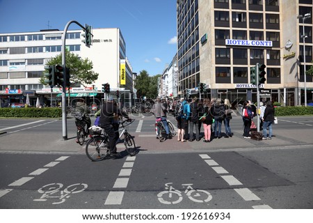 MUNSTER, GERMANY - MAY 3: Cross walk with bike lanes in the city of Munster. May 3, 2014 in Munster, North Rhine-Westphalia, Germany