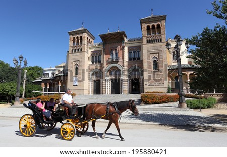 SEVILLE, SPAIN - JUNE 10: Horse drawn carriage in front of the Museum of Arts and Traditions in Seville. June 10th 2012 in Seville, Andalusia, Spain