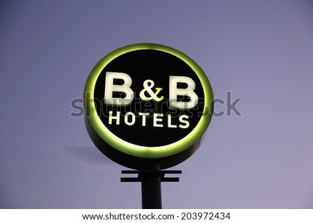 PERPIGNAN, FRANCE - JUNE 7: B and B Hotel Sign illuminated at dusk.  B&B is a french hotel chain with over 300 hotels across Europe. June 7th 2014 in Perpignan, France