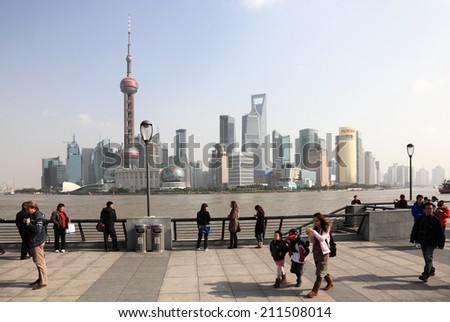 SHANGHAI, CHINA - NOV 22: Promenade at the Bund and skyline of Pudong. November 22, 2010, in Shanghai, China