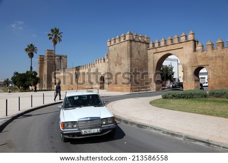 SALE, MOROCCO - MAY 22: Grand Taxi in front of the Medina Gate in Sale. May 22, 2013 in Sale, Morocco, North Africa