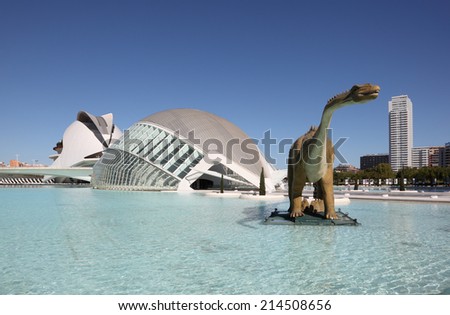 VALENCIA, SPAIN - OCT 9: Dinosaur sculpture and the L\'Hemisferic in the City of Arts and Sciences. October 9, 2011 in Valencia, Spain
