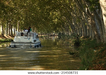 BEZIERS, FRANCE - OCT 2: Boat on Canal du Midi near Beziers, southern France. October 2, 2011 in Beziers, Herault department, Languedoc-Roussillon, France
