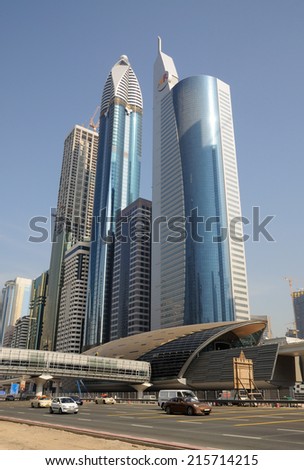 DUBAI, UAE - MAR 14: Skyscrapers and new Metro station at Sheikh Zayed Road in Dubai City. March 14, 2010 in Dubai, United Arab Emirates