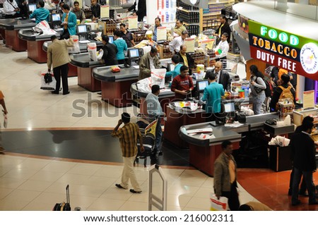 DUBAI, UAE - MAR 2: Shopping in the Duty Free Area of Dubai International Airport. March 2, 2009 in Dubai, United Arab Emirates