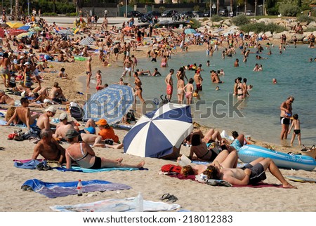 LA CIOTAT, FRANCE - JULY 6: Crowded beach in La Ciotat, southern France. July 6, 2008 in Marseille, Provence-Alpes-Cote d\'Azur, France