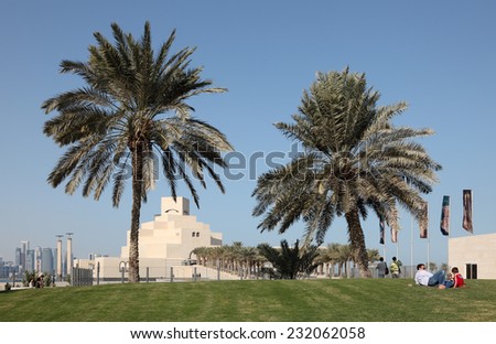DOHA, QATAR - JAN 6: Palm Trees in front of the Museum of Islamic Art in Doha. January 6, 2012 in Doha, Qatar, Middle East