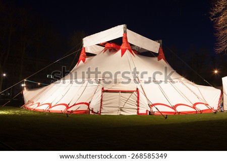 Illuminated big top circus tent at night