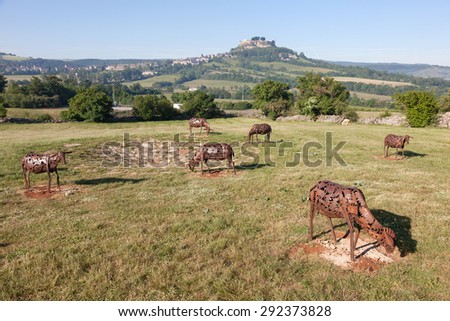 FRANCE - MAY 28: Sculptures of sheep herd on pasture at the highway A75 resting place. May 28, 2015 in Severac-le-Chateau, Aveyron department, France