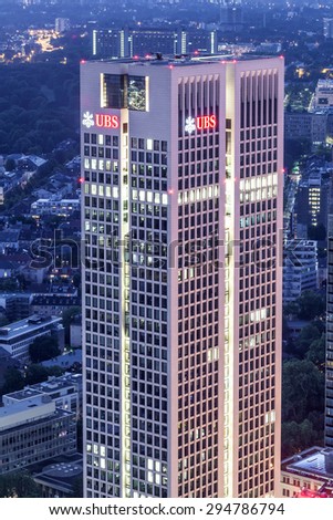 FRANKFURT MAIN - JUNE 27: The UBS Bank skyscraper in the city of Frankfurt at night. June 27, 2015 in Frankfurt Main, Germany