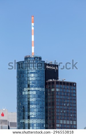 FRANKFURT - JULY 10: Top of the Main Tower skyscraper in the city of Frankfurt Main. July 10, 2015 in Frankfurt, Hesse, Germany