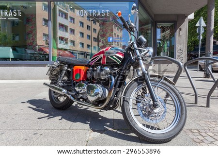 FRANKFURT, GERMANY - JULY 10: Classic motorcycle Triumph Bonneville T100 in the city of Frankfurt Main. July 10, 2015 in Frankfurt, Germany