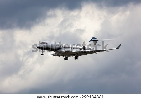 FRANKFURT, GERMANY - JULY 21: Private Bombardier Global Express business jet approaching Frankfurt International Airport (FRA). July 21, 2015 in Frankfurt Main, Germany
