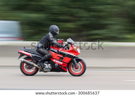 FRANKFURT, GERMANY - JULY 26: Honda CBR 1000F motorcycle moving fast on the highway A5 near Frankfurt. July 26, 2015 in Frankfurt Main, Germany