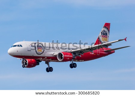 FRANKFURT, GERMANY - JULY 26: Air Berlin Airbus A320-200 with a Fan Force One painting landing at the Frankfurt International Airport (FRA). July 26, 2015 in Frankfurt Main, Germany