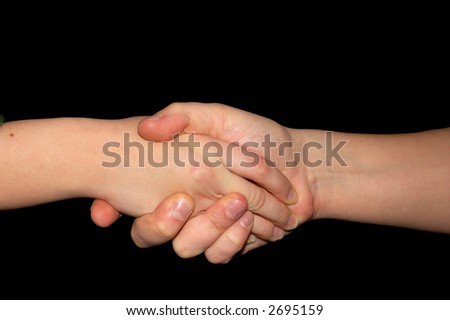 Handshake isolated on black