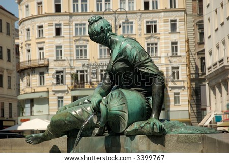 Statue of a Woman with an Amphora in Vienna, Austria
