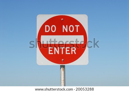Do Not Enter sign against blue sky
