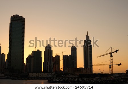 Skyscrapers construction site at sunset in Dubai