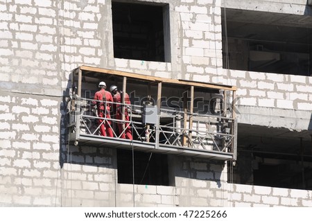 Exterior work at an unfinished building