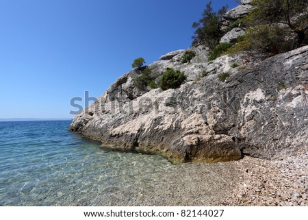 Rock and crystal clear water at the Adriatic coast in Croatia