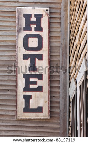 An old wooden hotel sign