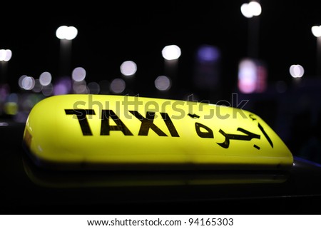 Taxi in Abu Dhabi at night, United Arab Emirates