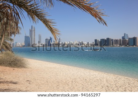 Beach and the skyline of Abu Dhabi, United Arab Emirates