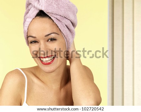 Young Woman Wrapped in a Towel