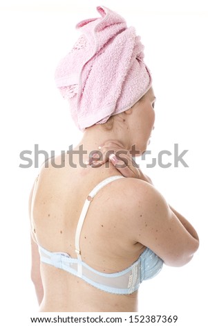 Model Released.  Young Woman with a Stiff Neck