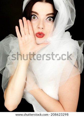 Sexy Young Woman Wearing a Wedding Veil