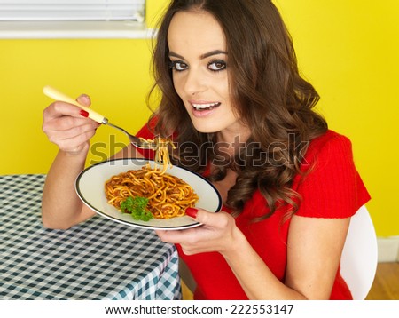 Attractive Young Woman Eating Spaghetti Bolognese