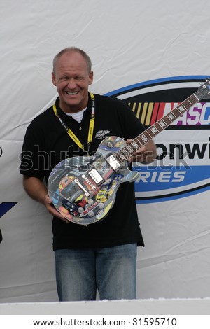 GLADEVILLE, TN - JUNE 6:Sam Bass and trophy at the Federated Auto Parts 300 at Nashville Superspeedway, June 6, 2009